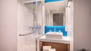 Shower, rainfall showerhead, eco-friendly toiletries, hair dryer