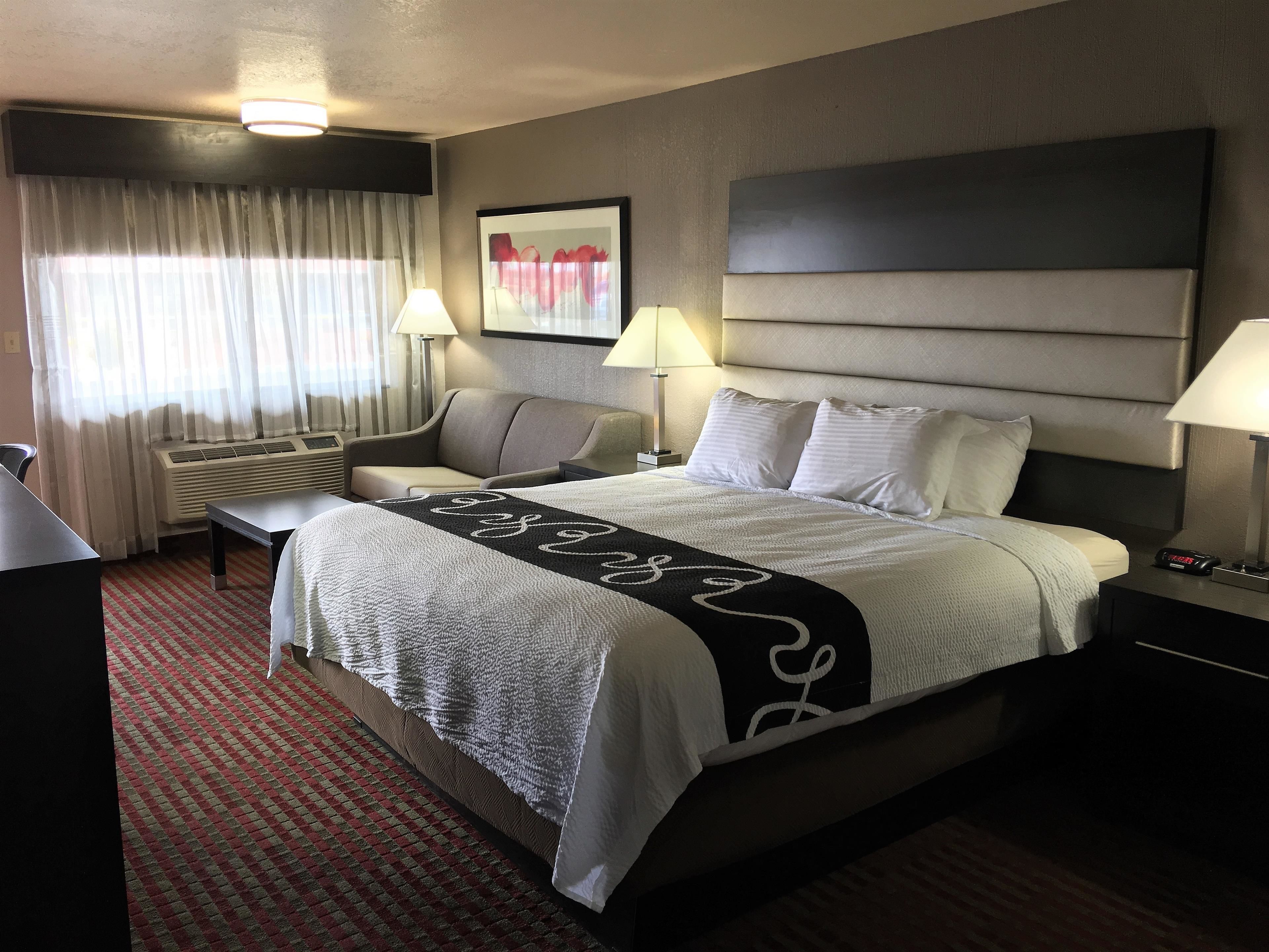 premium bedding, desk, blackout curtains, iron/ironing board