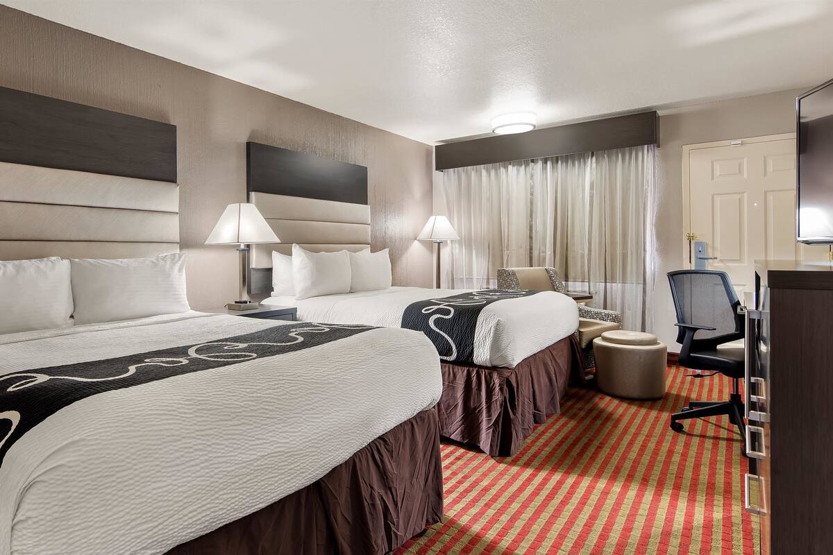 premium bedding, desk, blackout curtains, iron/ironing board