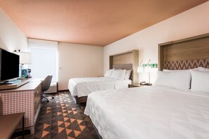 Ropa de cama de alta calidad, camas con pillow-top y escritorio 