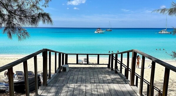 Beach nearby, white sand, beach towels, scuba diving