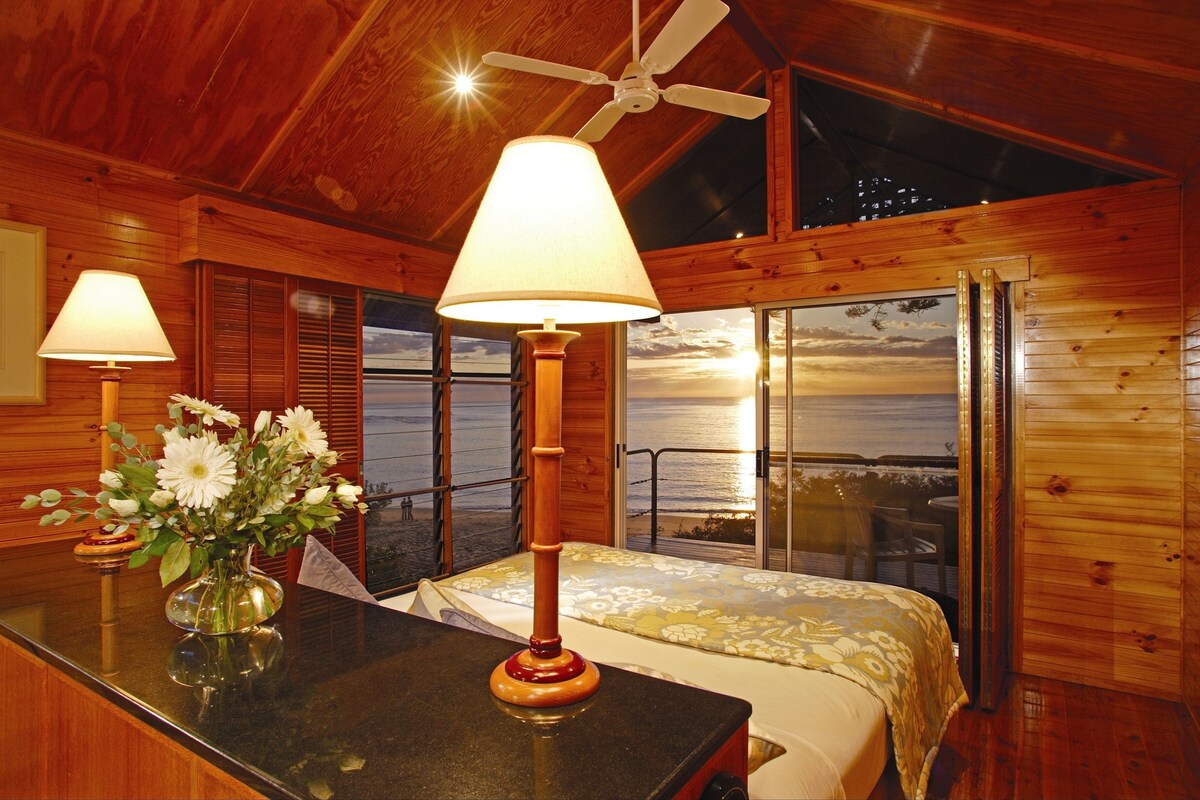 Deluxe Room, 1 King Bed, Fireplace, Beachfront | Pillowtop beds, in-room safe, desk, iron/ironing board