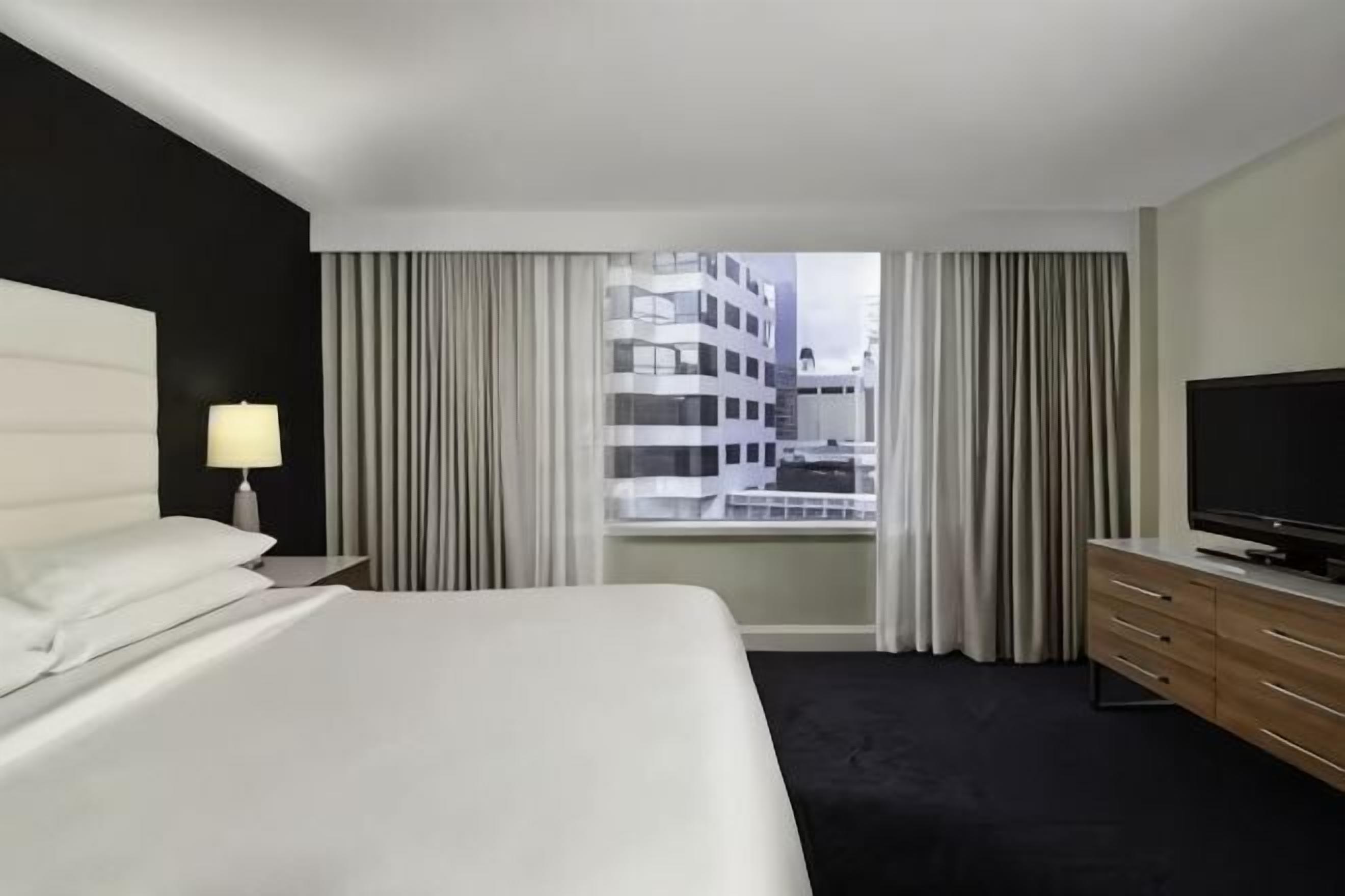 Premium bedding, pillow-top beds, in-room safe, desk