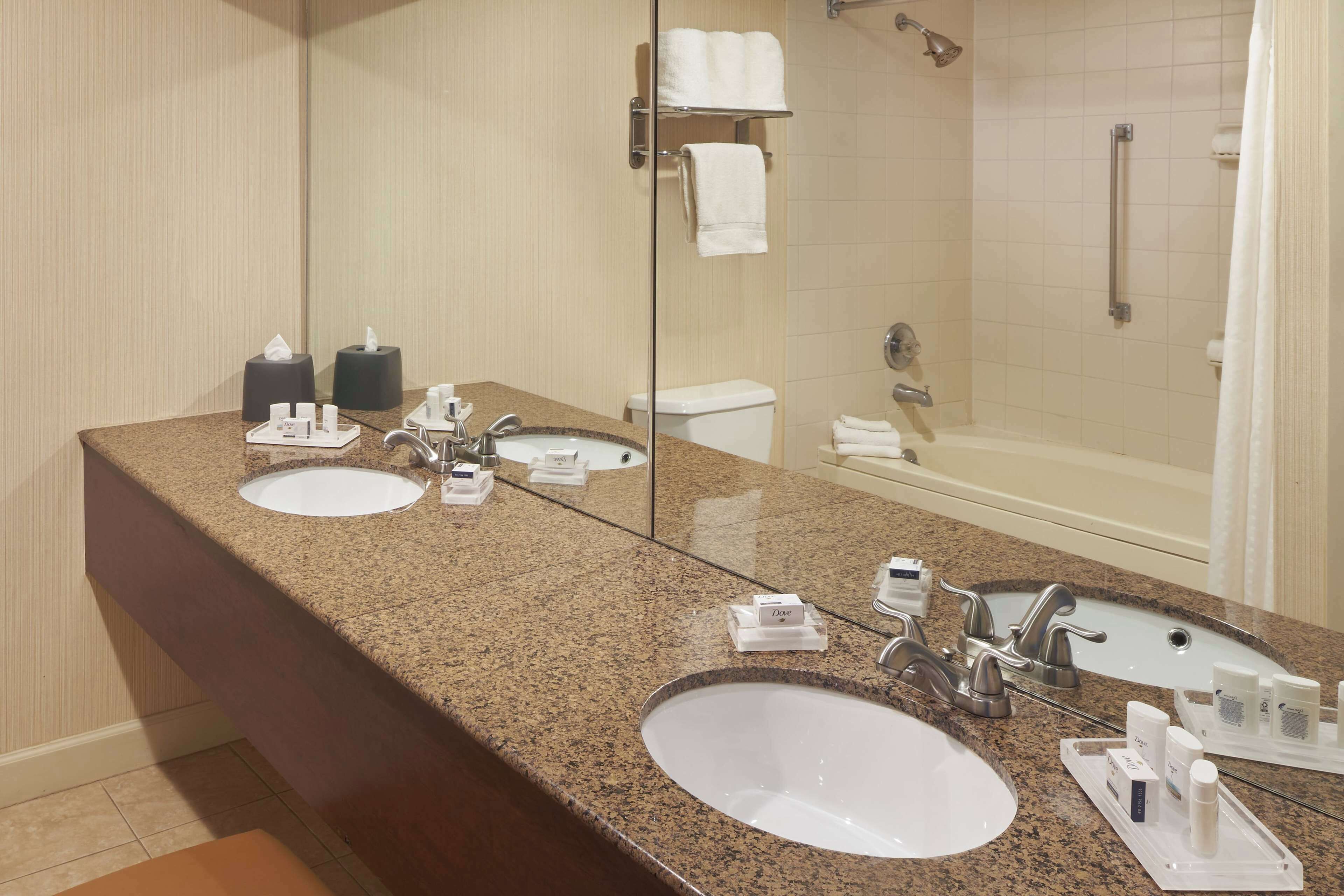 suite, multiple beds, non smoking | bathroom | free toiletries, hair dryer, towels