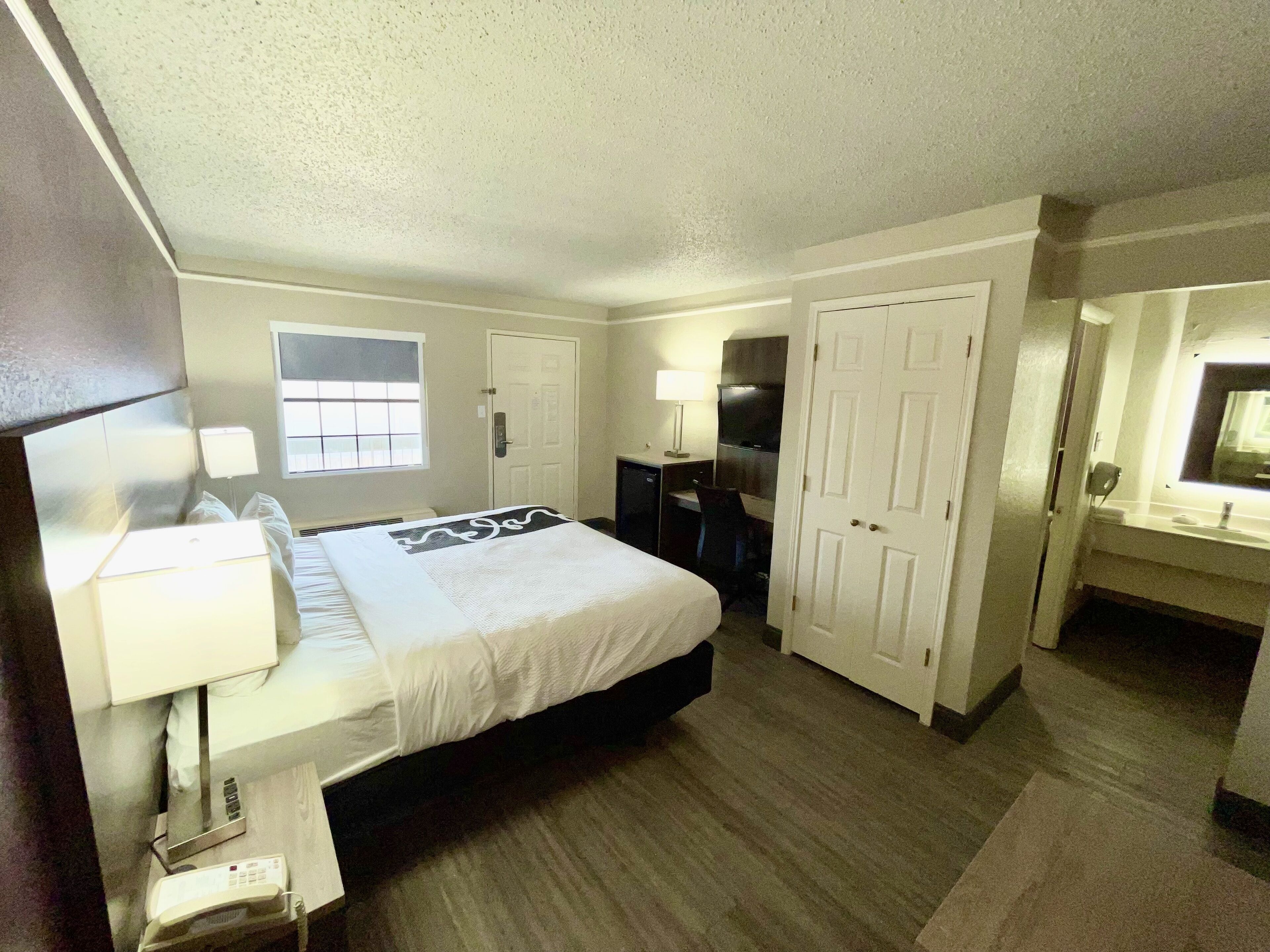 Premium bedding, desk, blackout curtains, iron/ironing board