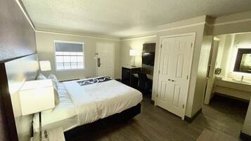 Premium bedding, desk, blackout curtains, iron/ironing board