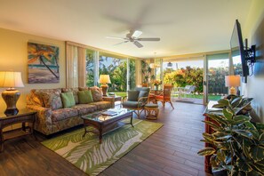 Room, 2 Bedrooms, 2 Bathrooms, Garden View (Unit L100) | Living area | 32-inch LCD TV with cable channels, DVD player