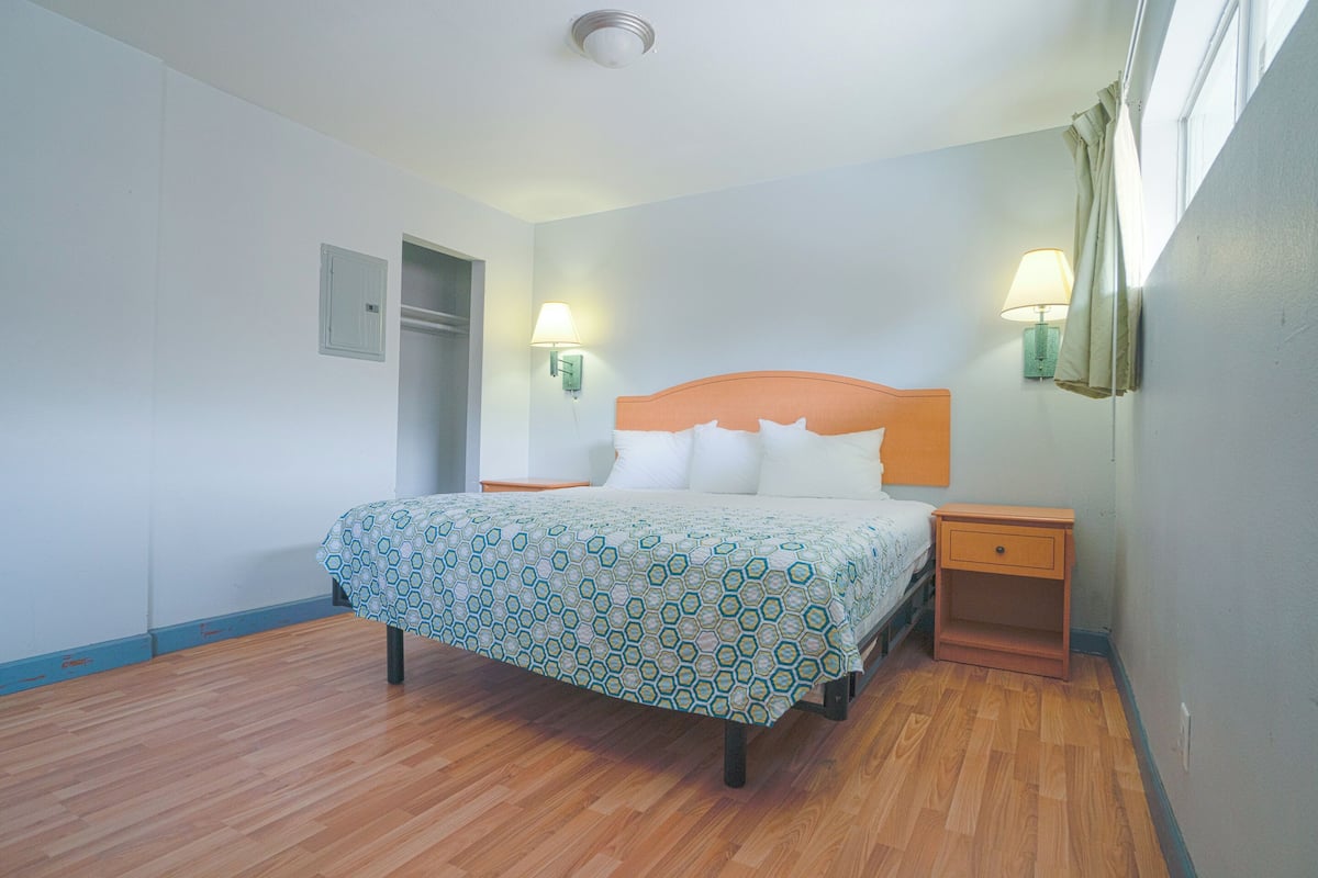 Desk, WiFi (free), alarm clocks, bed sheets