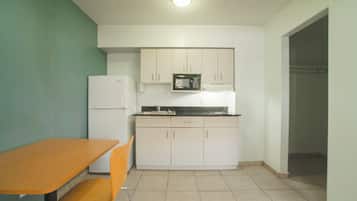 Full-sized fridge, microwave, coffee/tea maker, dining tables