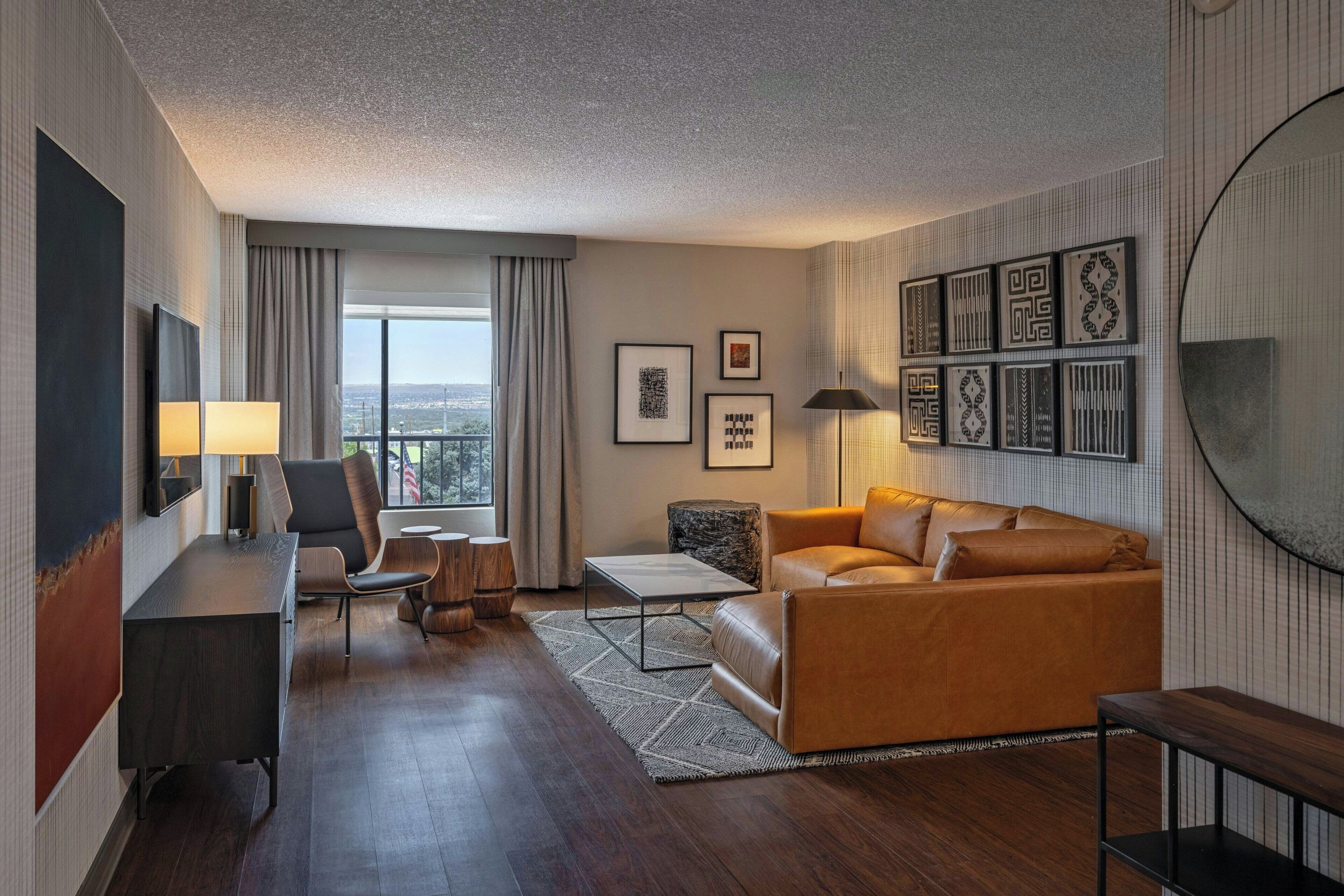 Junior Suite, 1 Bedroom | Living room | 55-inch flat-screen TV with cable channels, Smart TV, pay movies