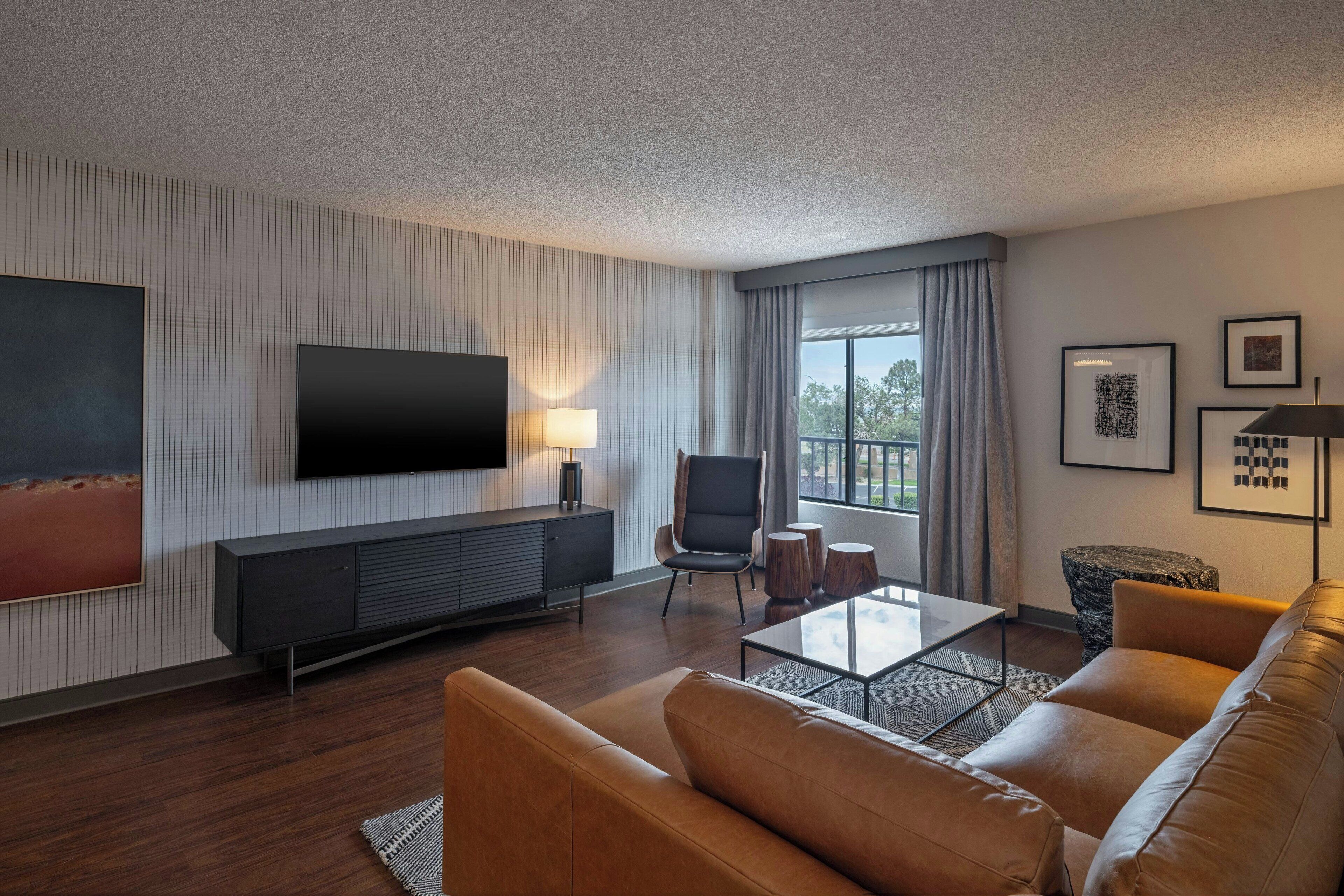 junior suite, 1 bedroom | living room | 55-inch flat-screen tv with cable channels, smart tv, pay films