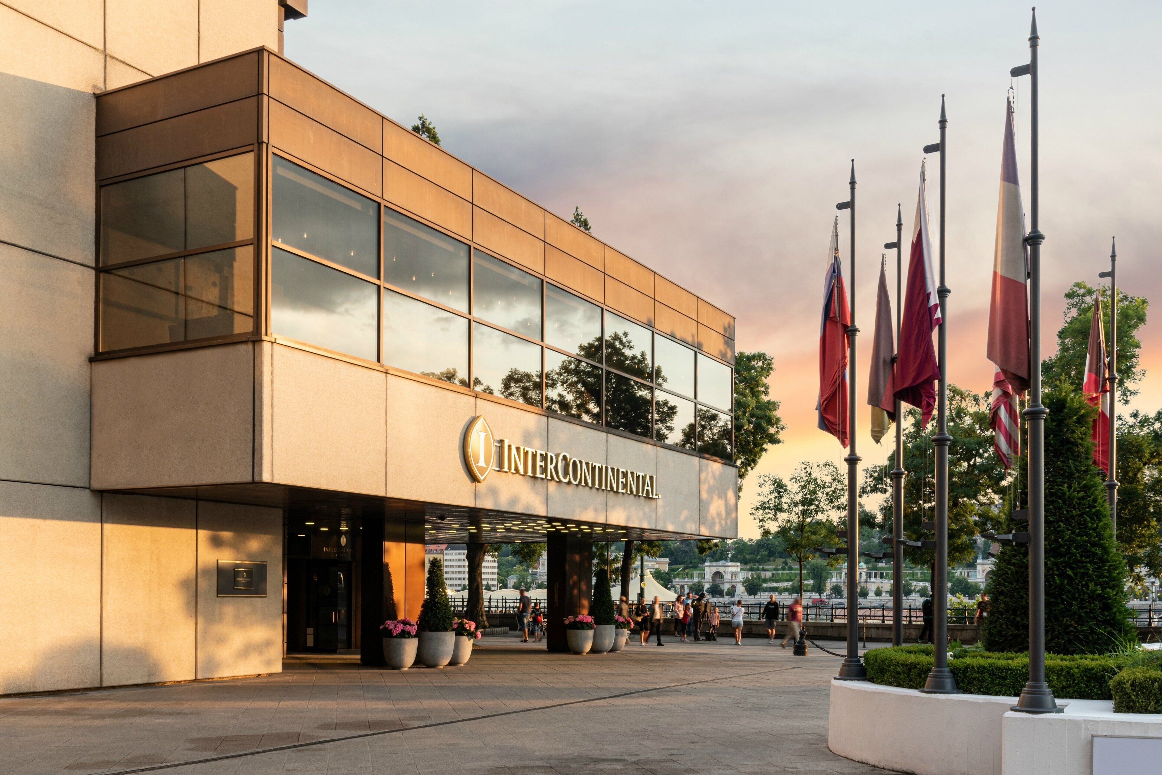 A modern building with a glass facade and the name "Intercontinental" on the entrance.