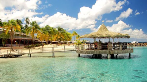 On the beach, beach umbrellas, beach towels, snorkeling