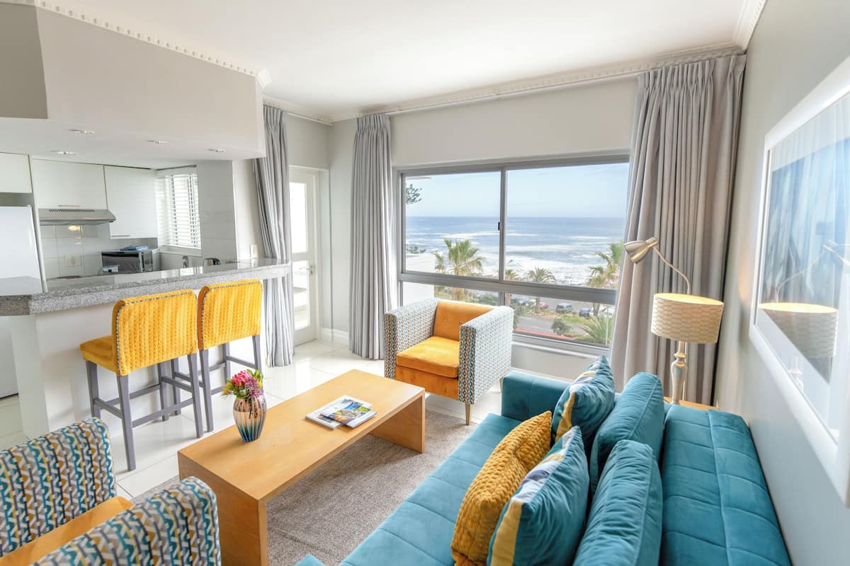 Suite, 1 Bedroom | Living area | 32-inch LCD TV with satellite channels, TV, Netflix