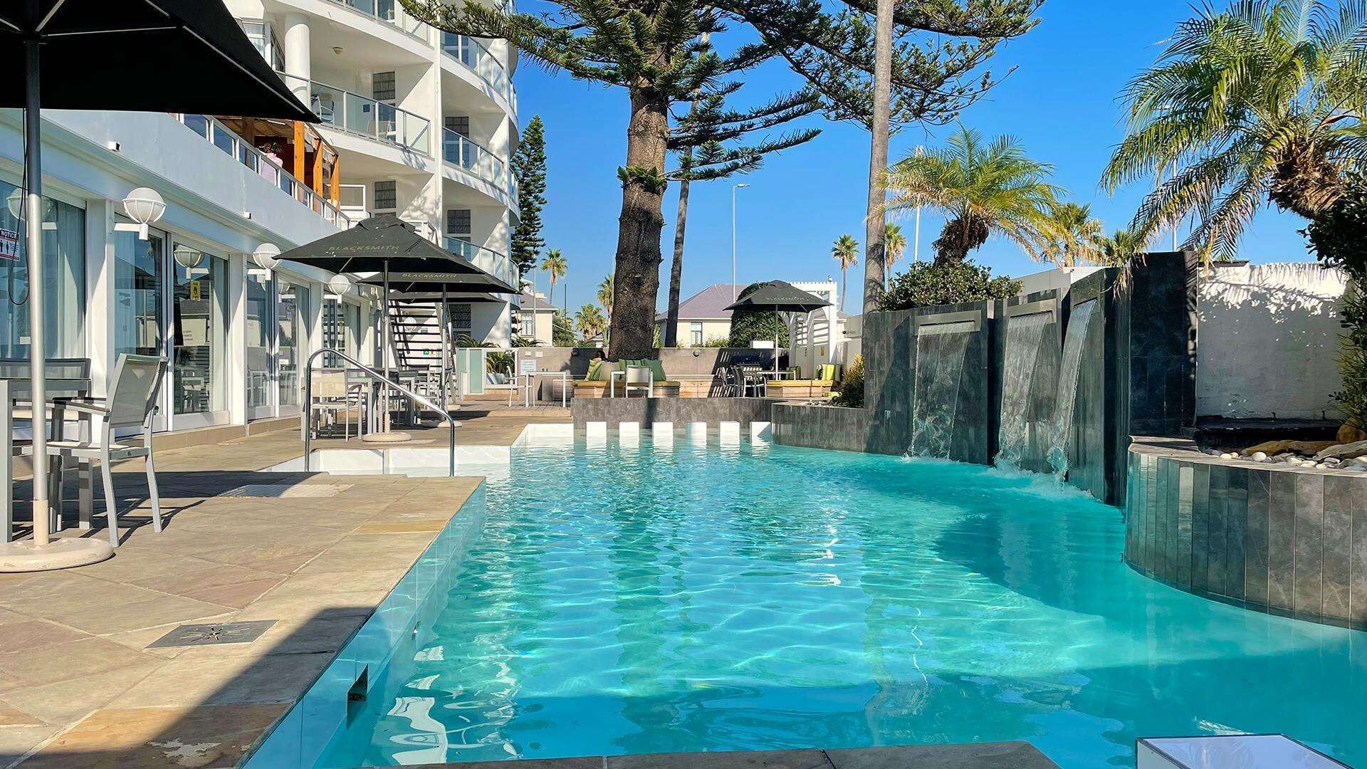 2 outdoor pools, pool umbrellas, pool loungers