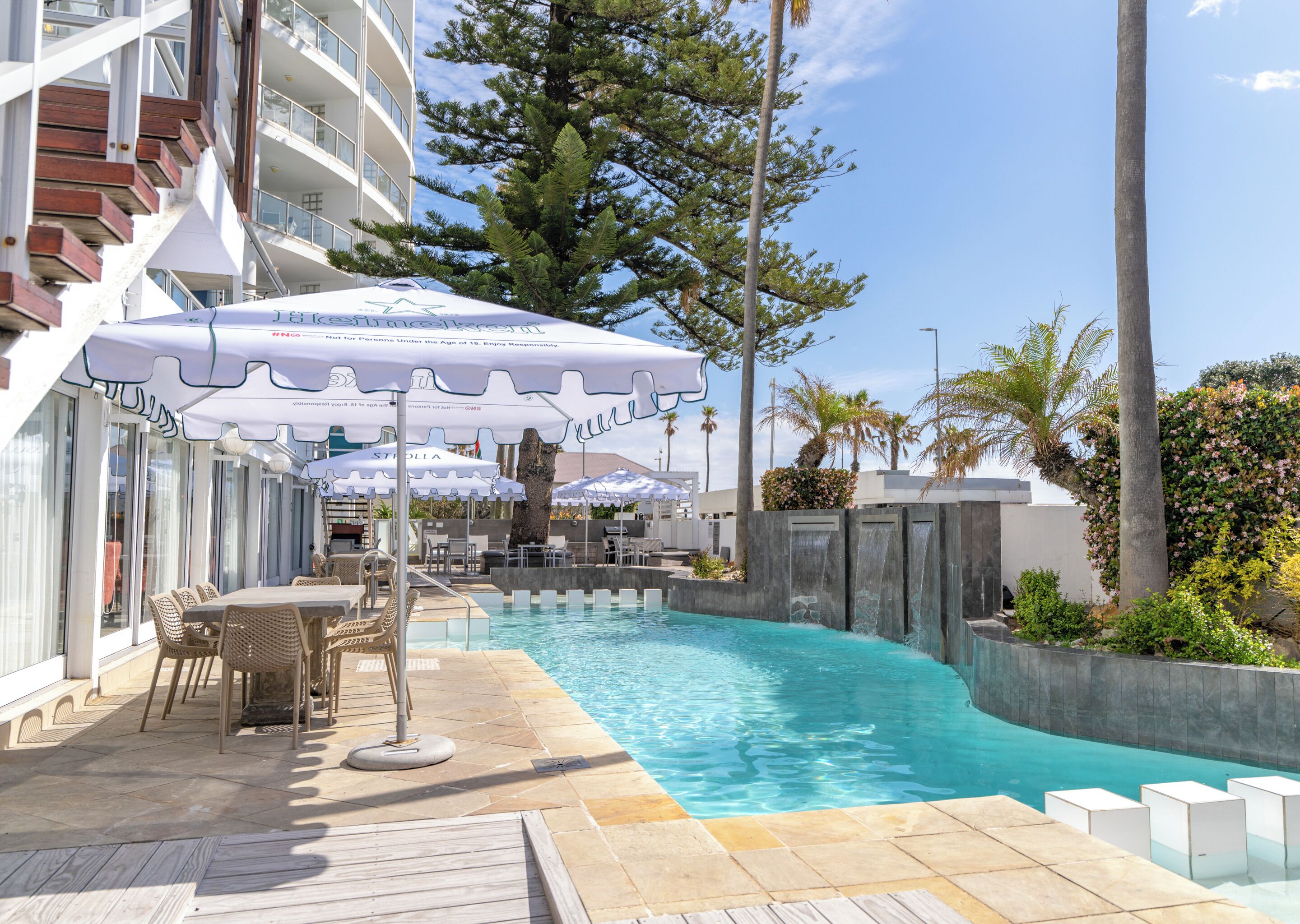 2 outdoor pools, pool umbrellas, pool loungers