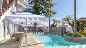 2 outdoor pools, pool umbrellas, pool loungers
