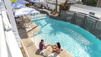 2 outdoor pools, pool umbrellas, sun loungers