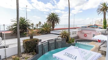 2 outdoor pools, pool umbrellas, sun loungers