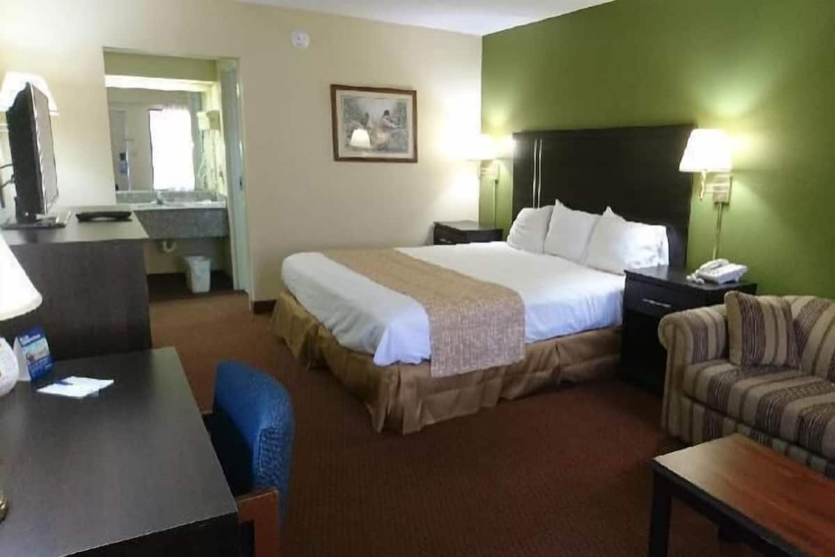 Desk, blackout curtains, iron/ironing board, rollaway beds