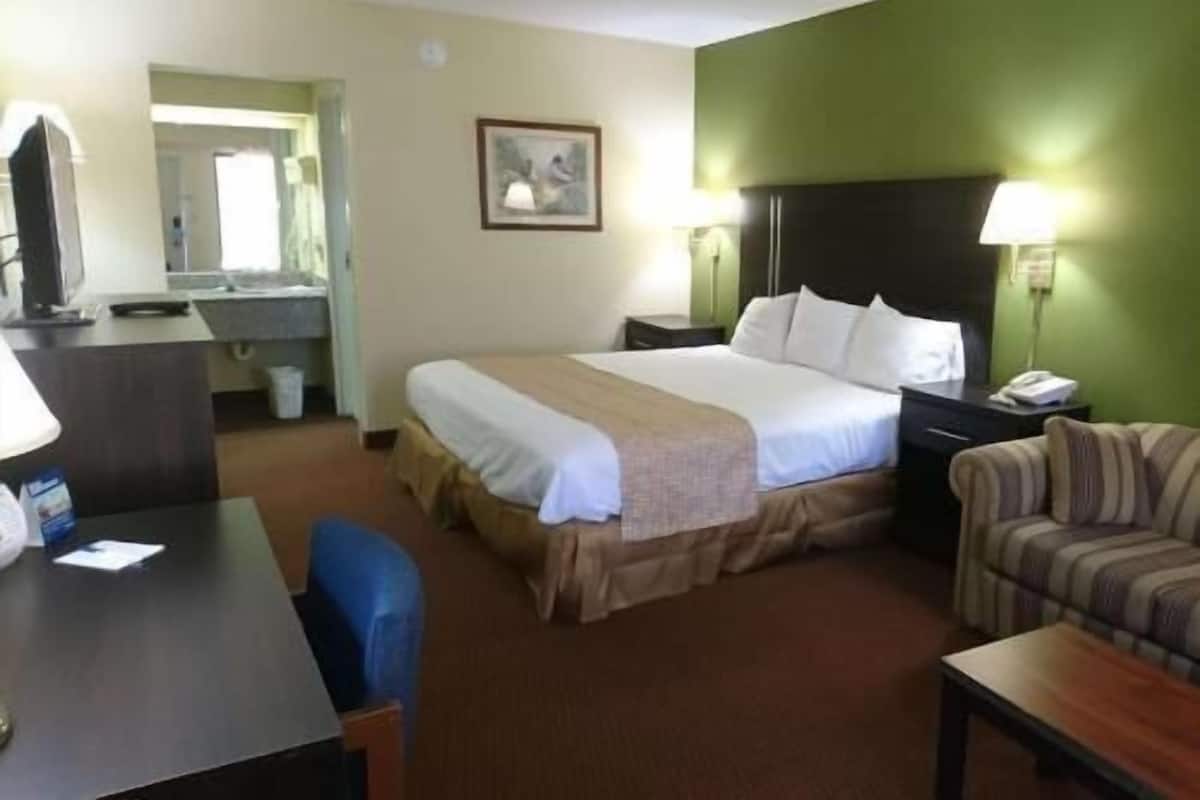 Desk, blackout curtains, iron/ironing board, rollaway beds