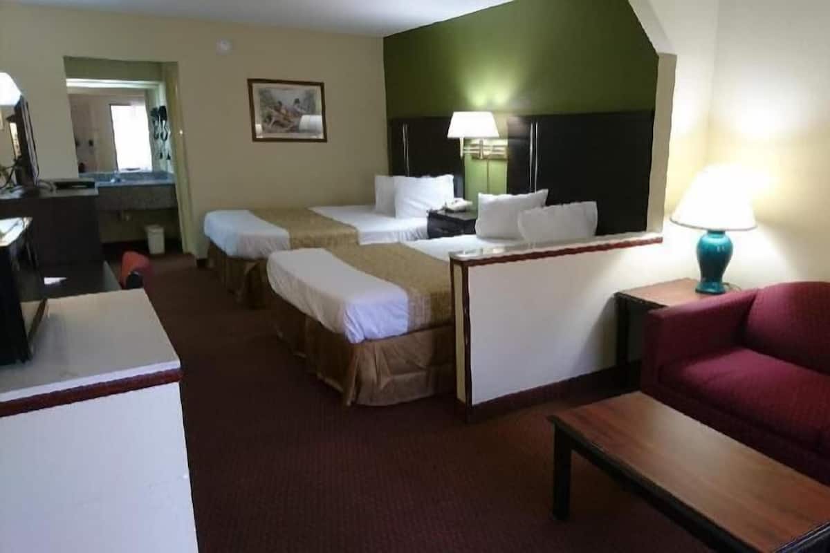 Desk, blackout curtains, iron/ironing board, rollaway beds