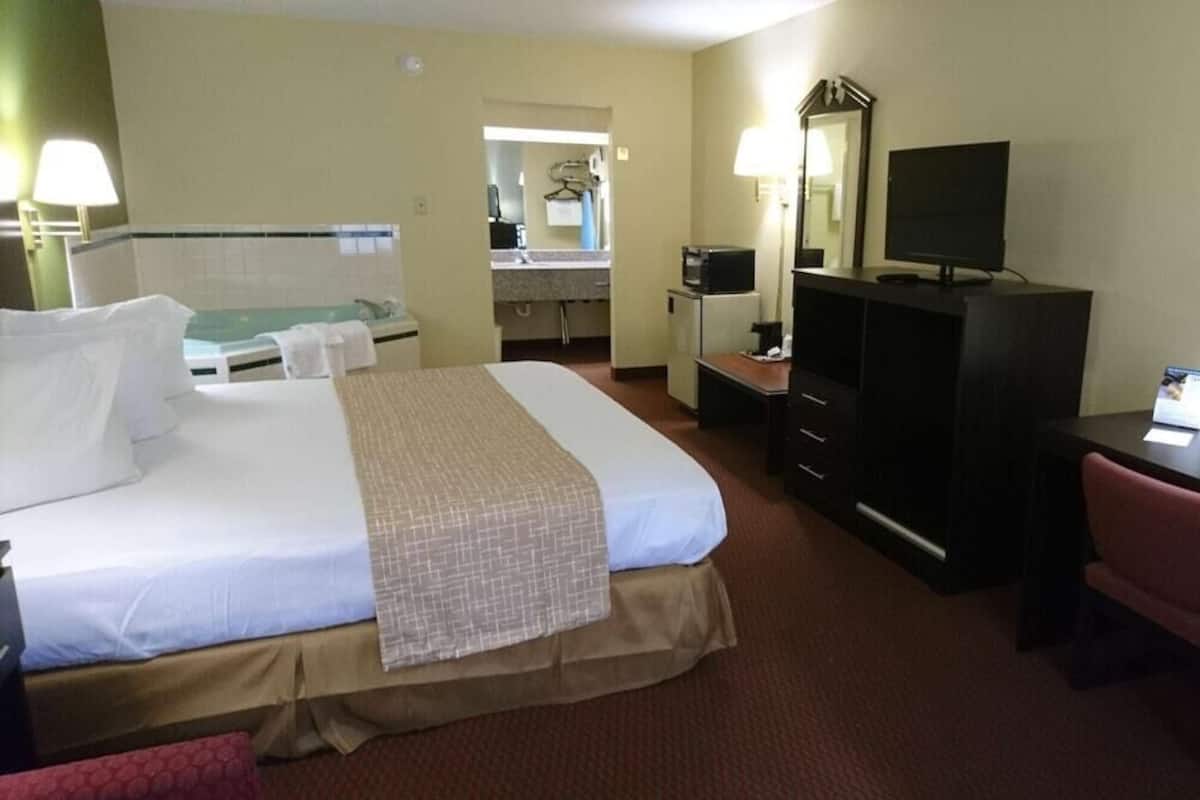 Desk, blackout curtains, iron/ironing board, rollaway beds