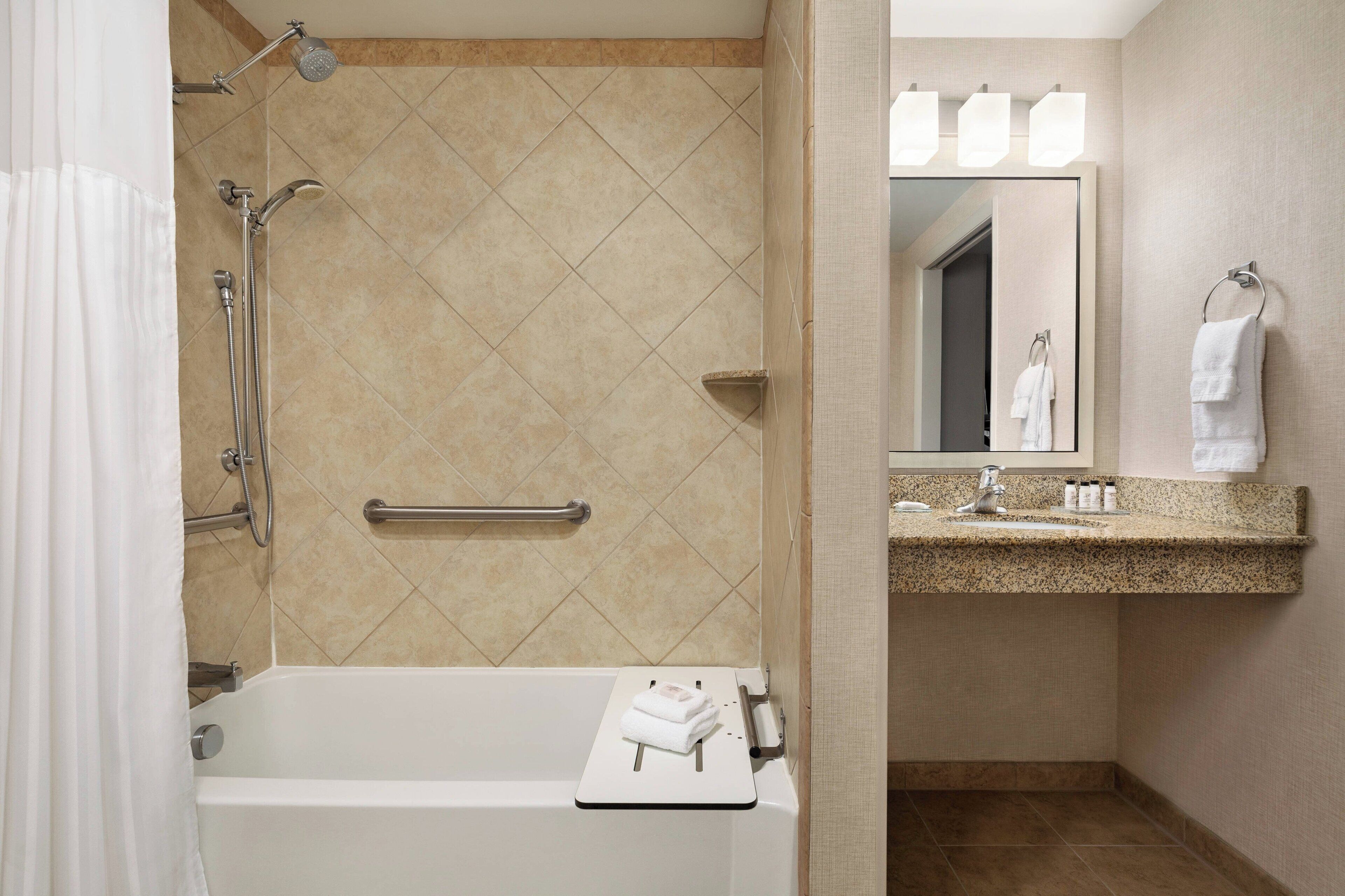 combined shower/bathtub, free toiletries, hair dryer, towels