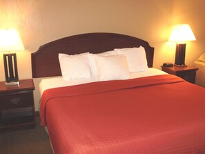 Deluxe Room, 1 King Bed | In-room safe, desk, blackout drapes, iron/ironing board