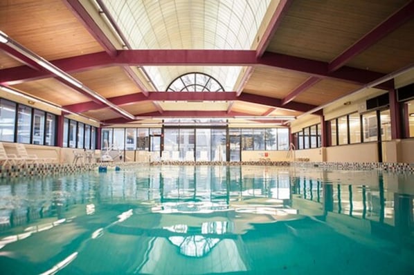 Indoor pool, open 7:00 AM to 10:00 PM, sun loungers