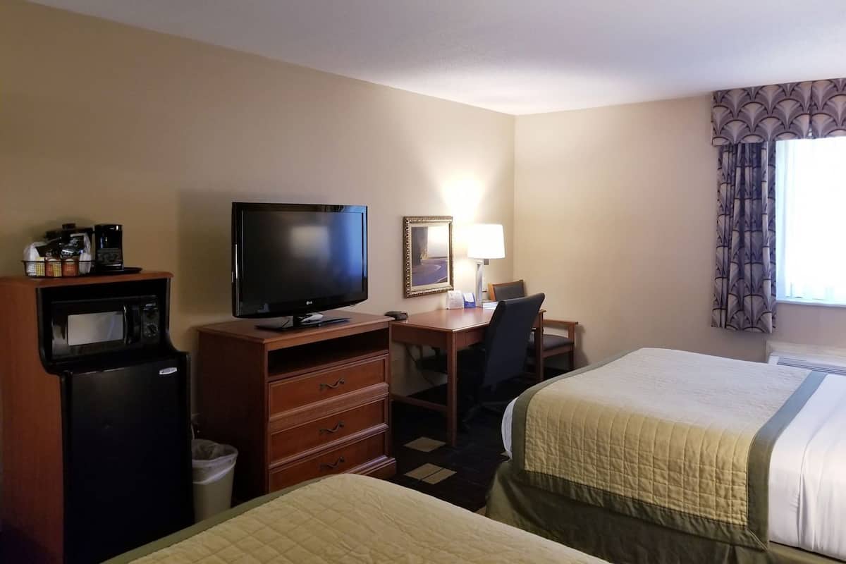 Pillowtop beds, desk, iron/ironing board, free cribs/infant beds