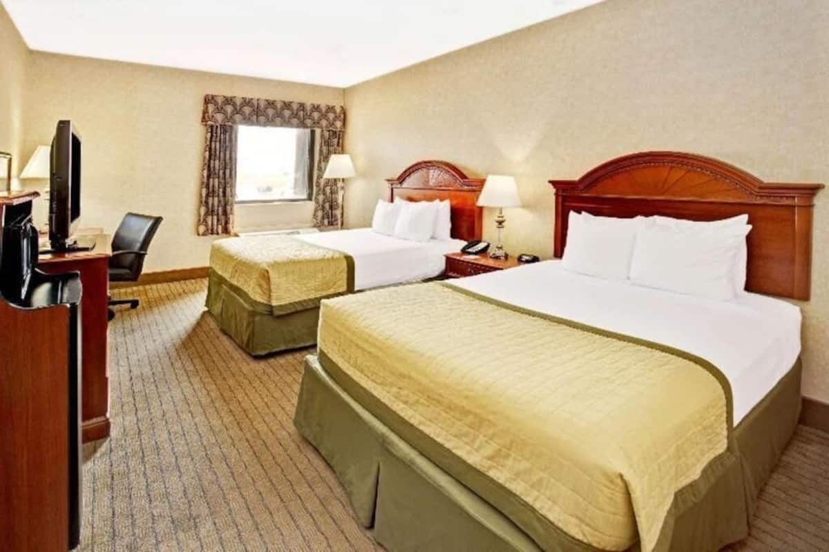 Pillowtop beds, desk, iron/ironing board, free cribs/infant beds