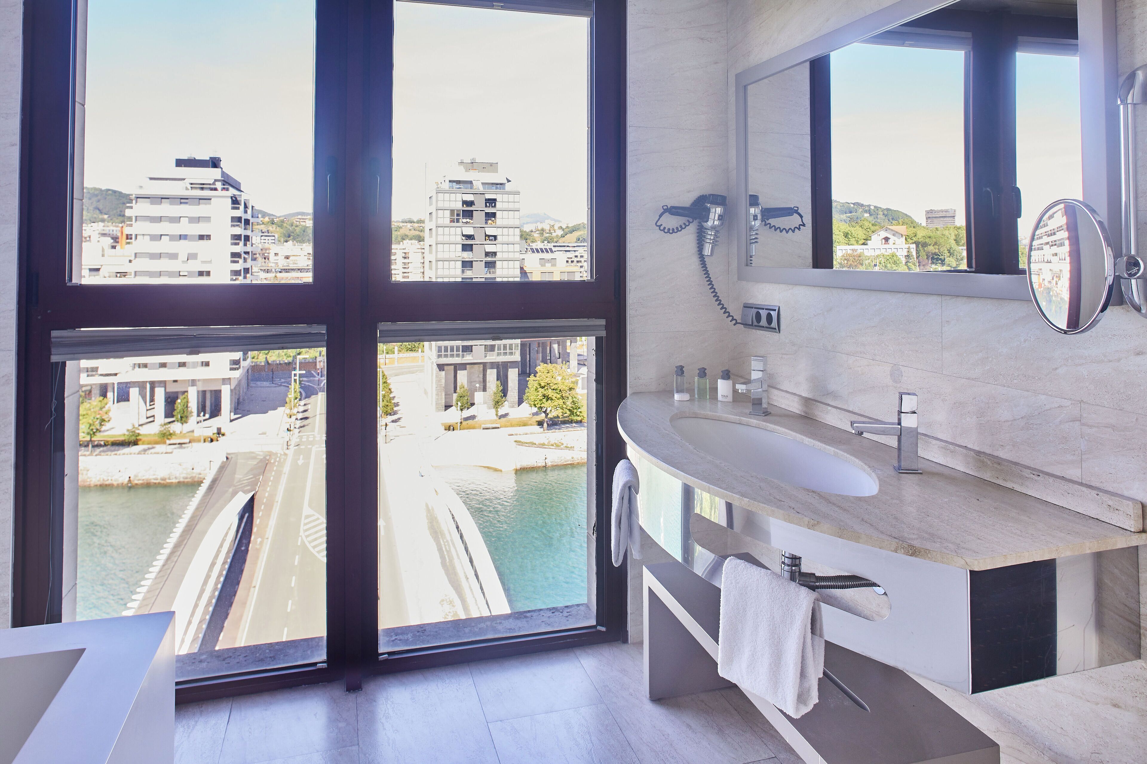 suite, terrace, city view | bathroom | hair dryer, towels