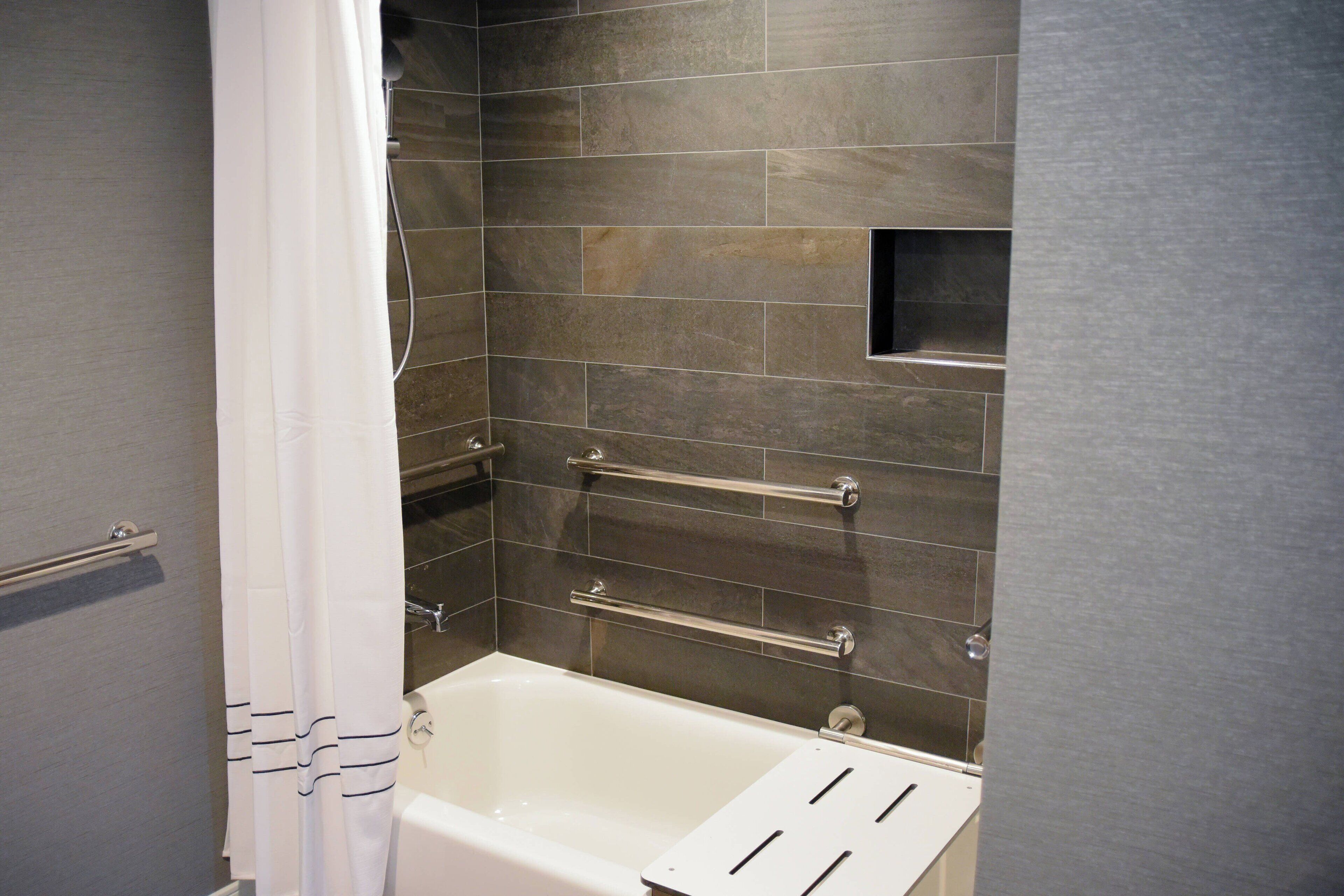 Combined shower/tub, designer toiletries, hair dryer, bathrobes