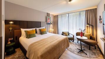 Deluxe kamer | Een bureau, een laptopwerkplek, verduisterende gordijnen, gratis wifi