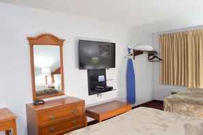 Suite, Multiple Beds, Non Smoking | Laptop workspace, blackout curtains, soundproofing, iron/ironing board