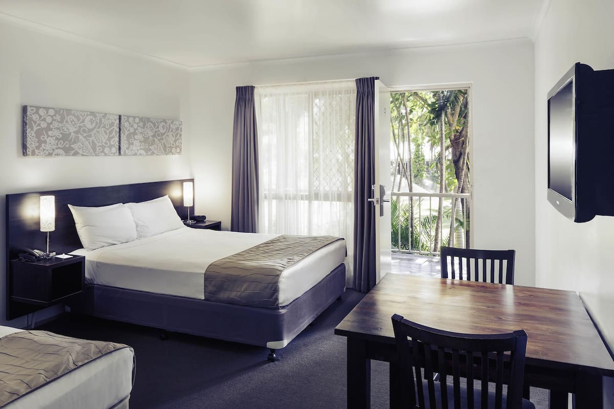 standard room, multiple beds | premium bedding, in-room safe, blackout curtains, iron/ironing board