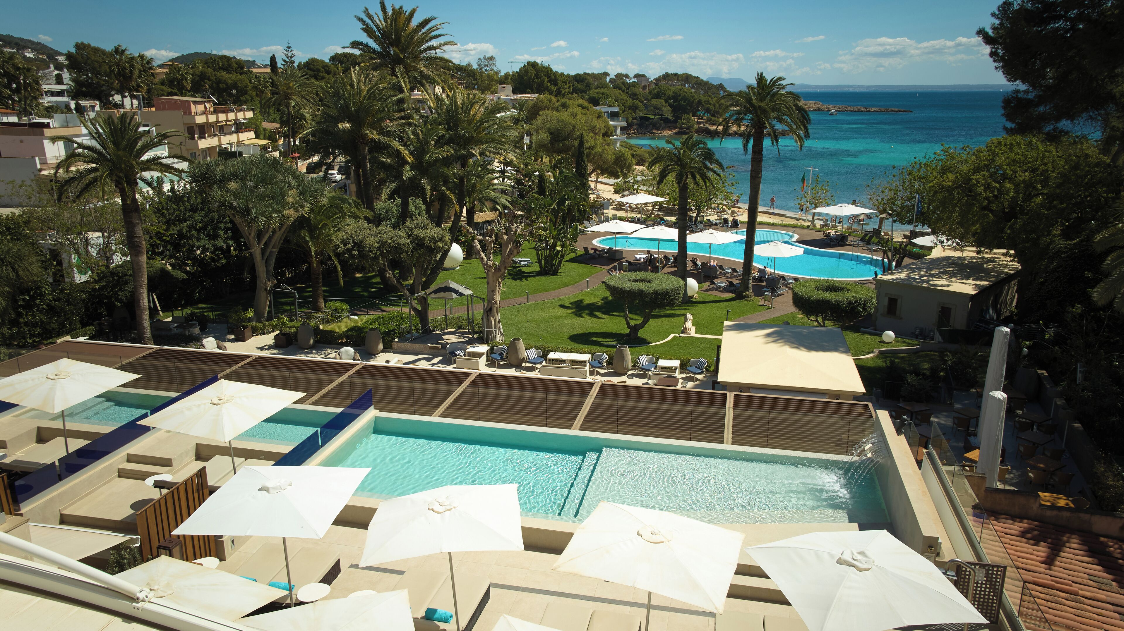 indoor pool, outdoor pool, pool umbrellas, pool loungers