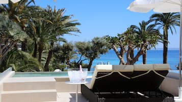 Indoor pool, outdoor pool, pool umbrellas, sun loungers