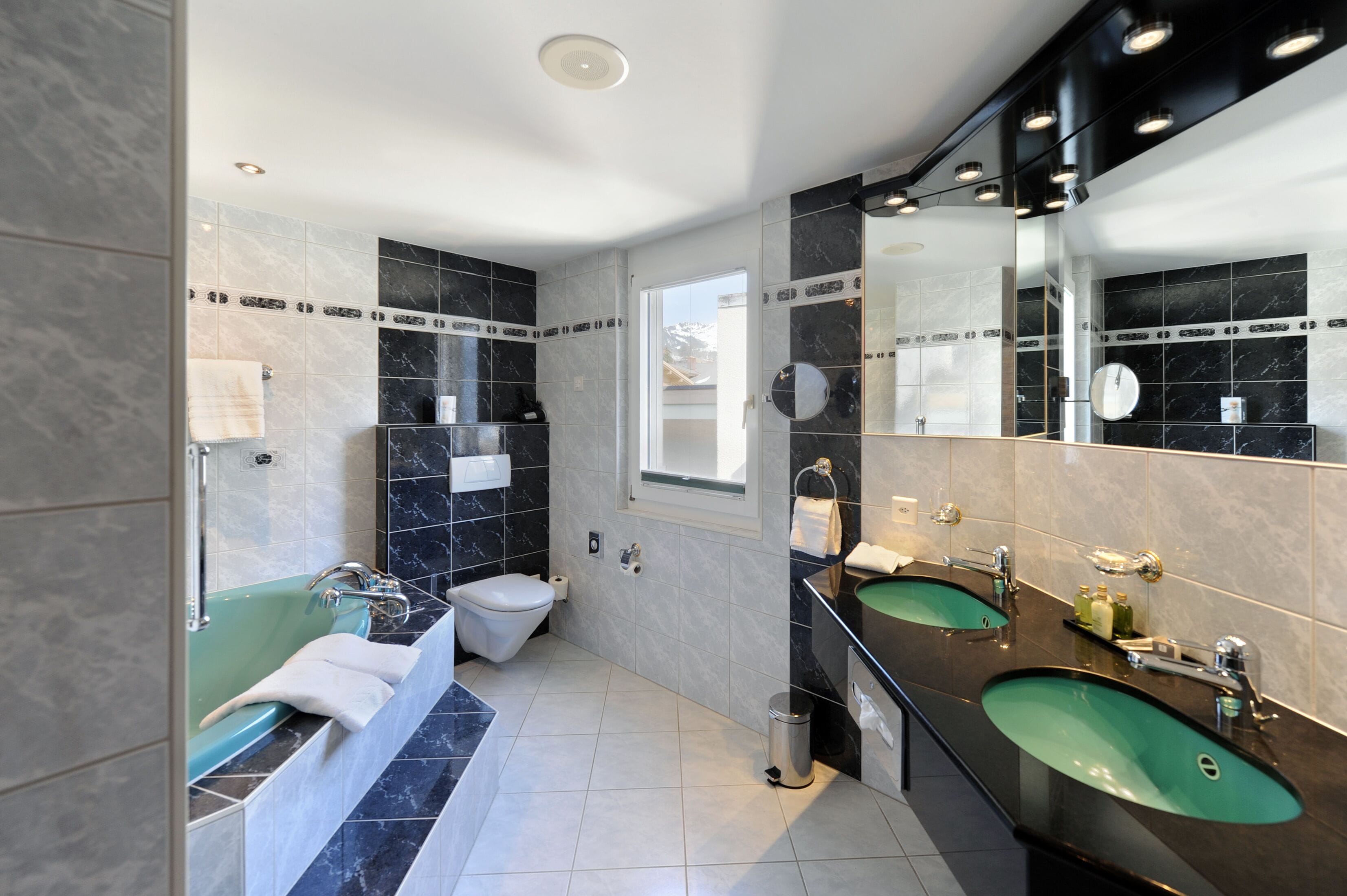 junior suite eiger firn | bathroom | separate bathtub and shower, deep-soaking bathtub