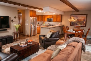 Condo, 2 Bedrooms, 2 Bathrooms | Living area | 24-inch Smart TV with satellite channels, TV, fireplace