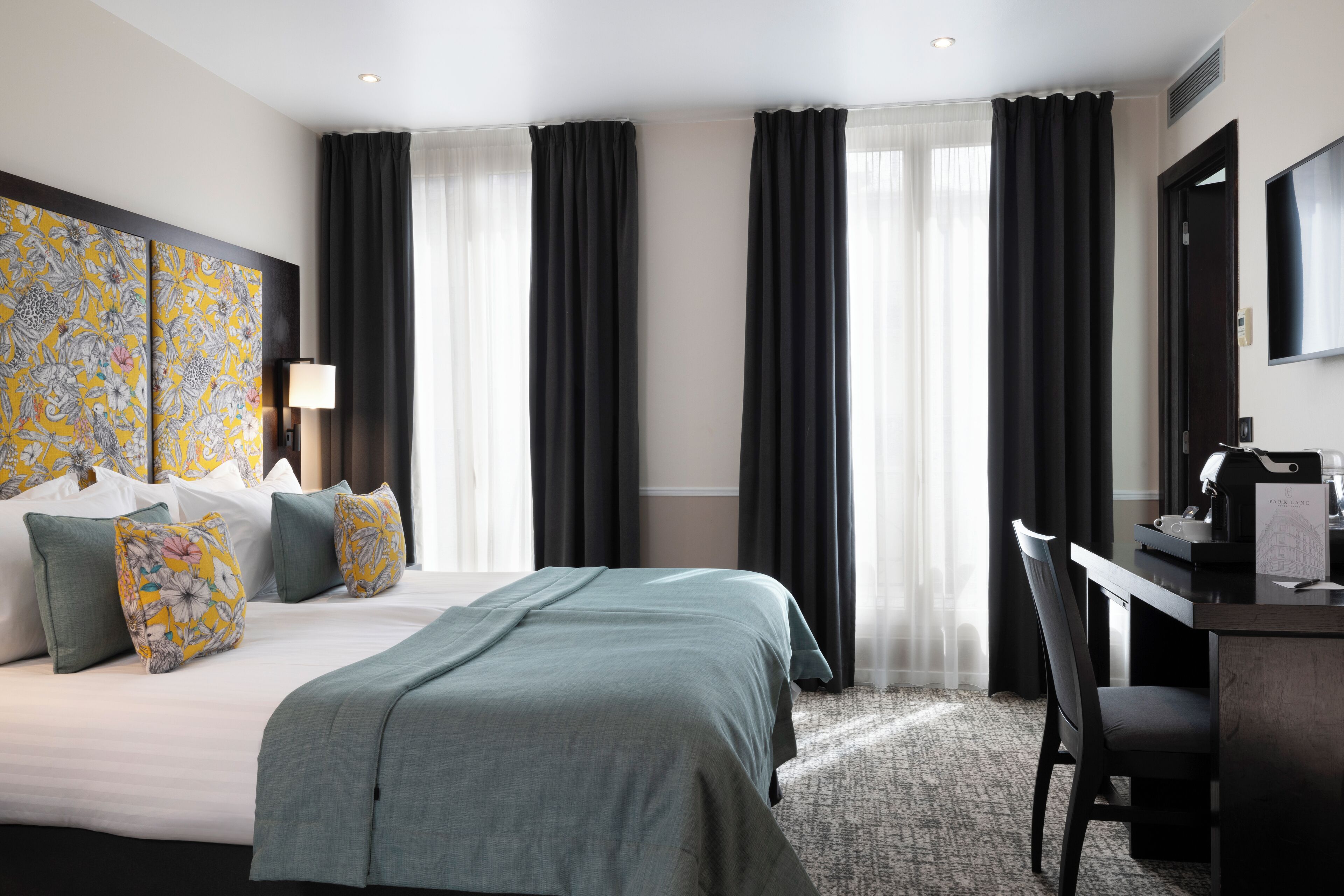 deluxe twin room | premium bedding, minibar, in-room safe, individually decorated