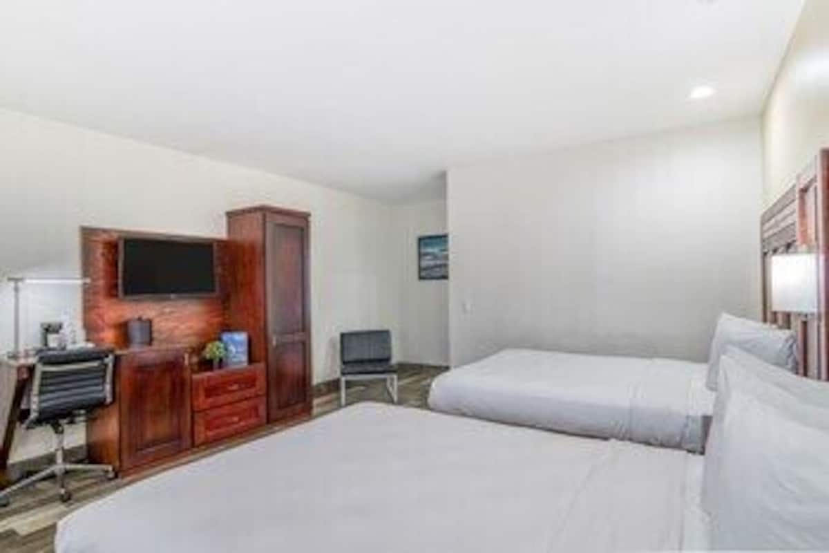 Premium bedding, pillowtop beds, blackout drapes, iron/ironing board
