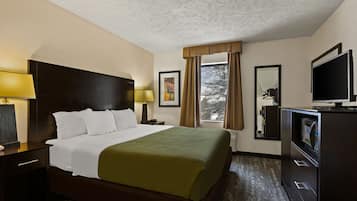 Chambre, 1 très grand lit, non-fumeurs | 1 chambre, rideaux occultants, fer et planche à repasser