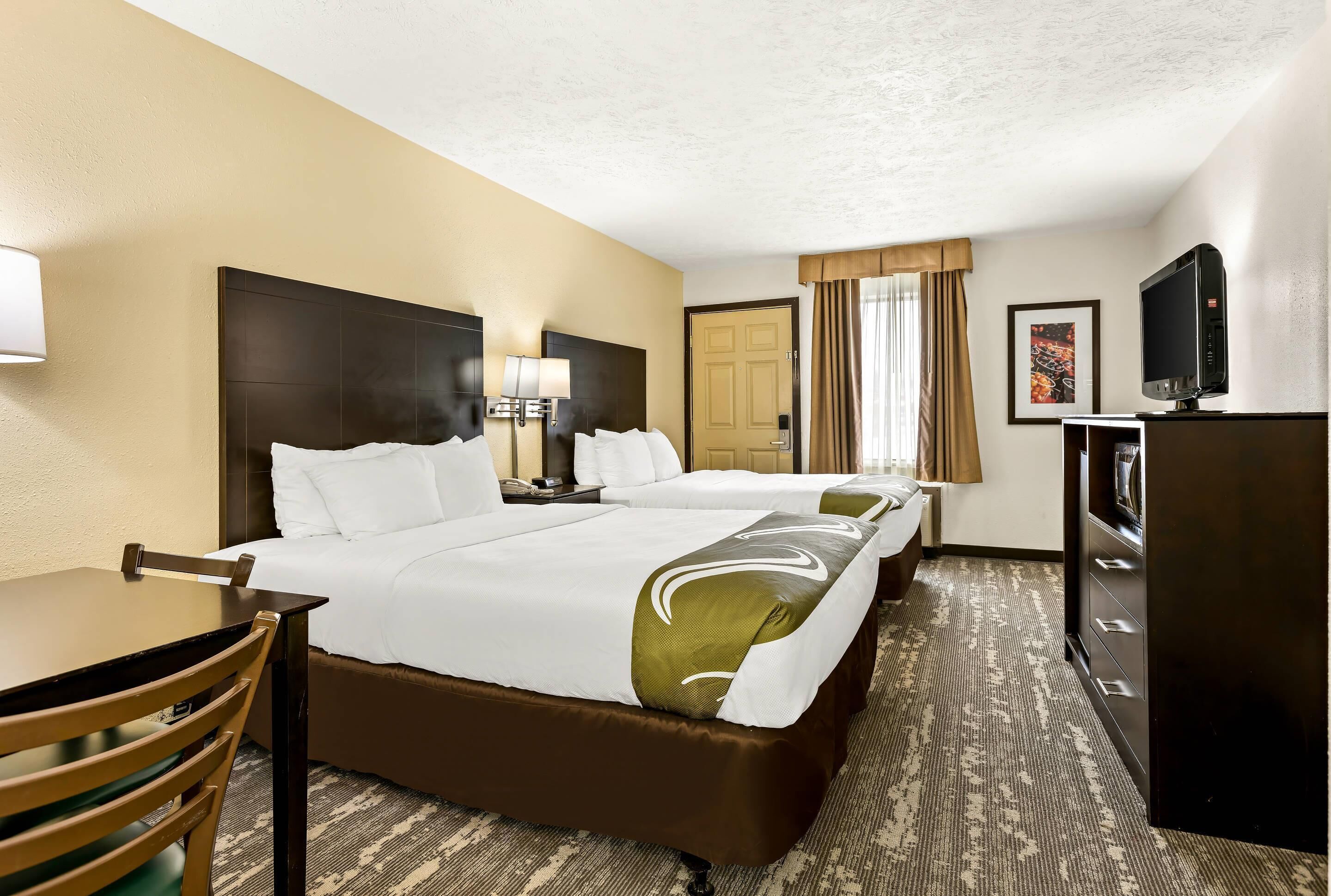 Standard Room, 2 Queen Beds, Non Smoking | Blackout drapes, iron/ironing board, free cribs/infant beds, free WiFi