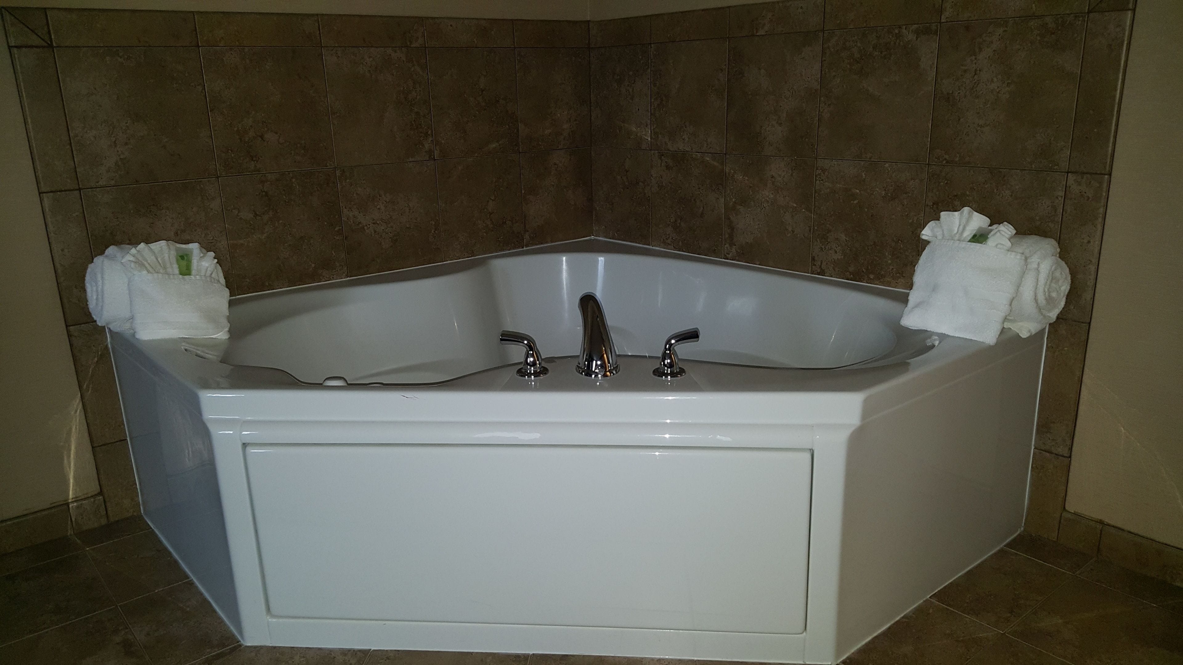 standard room, 1 king bed, non smoking, refrigerator & microwave (whirlpool tub) | jetted bathtub