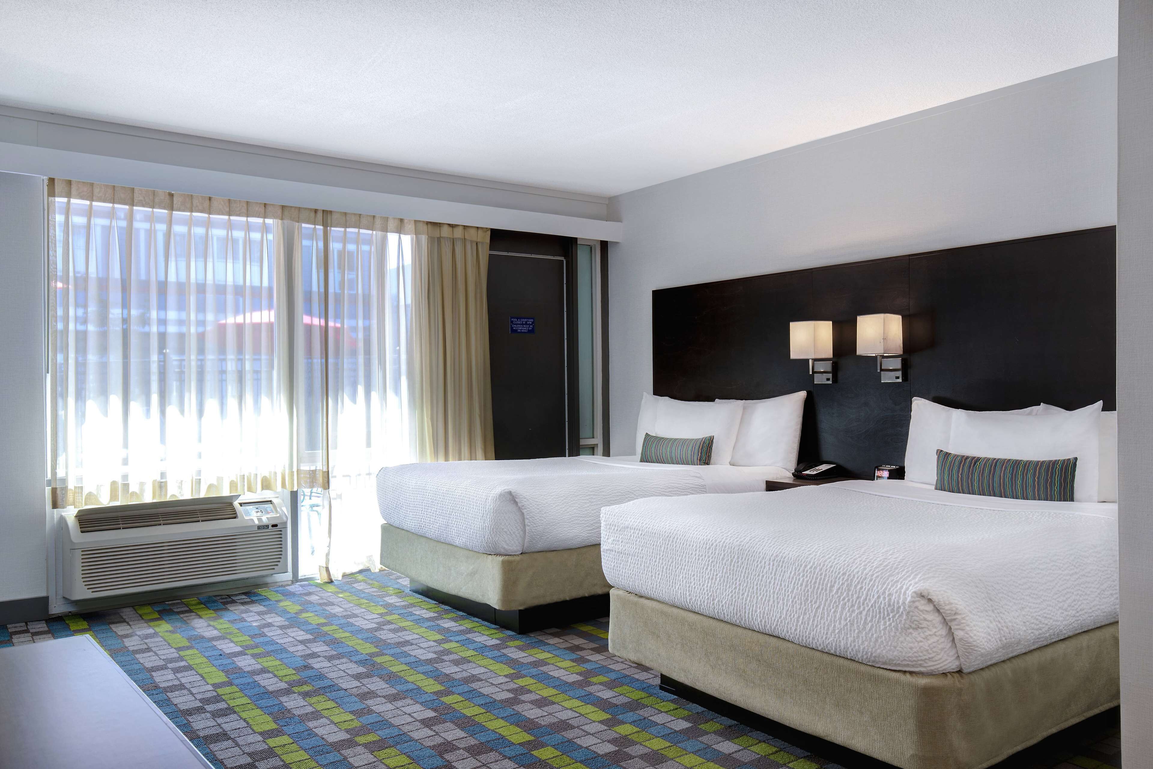 room, 2 double beds, non smoking (efficiency) | desk, blackout curtains, iron/ironing board, free cots/infant beds