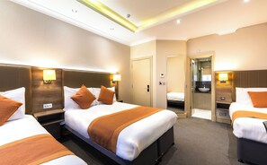 Standard Quadruple Room | In-room safe, desk, laptop workspace, blackout drapes - Sidney Hotel London Victoria (London)