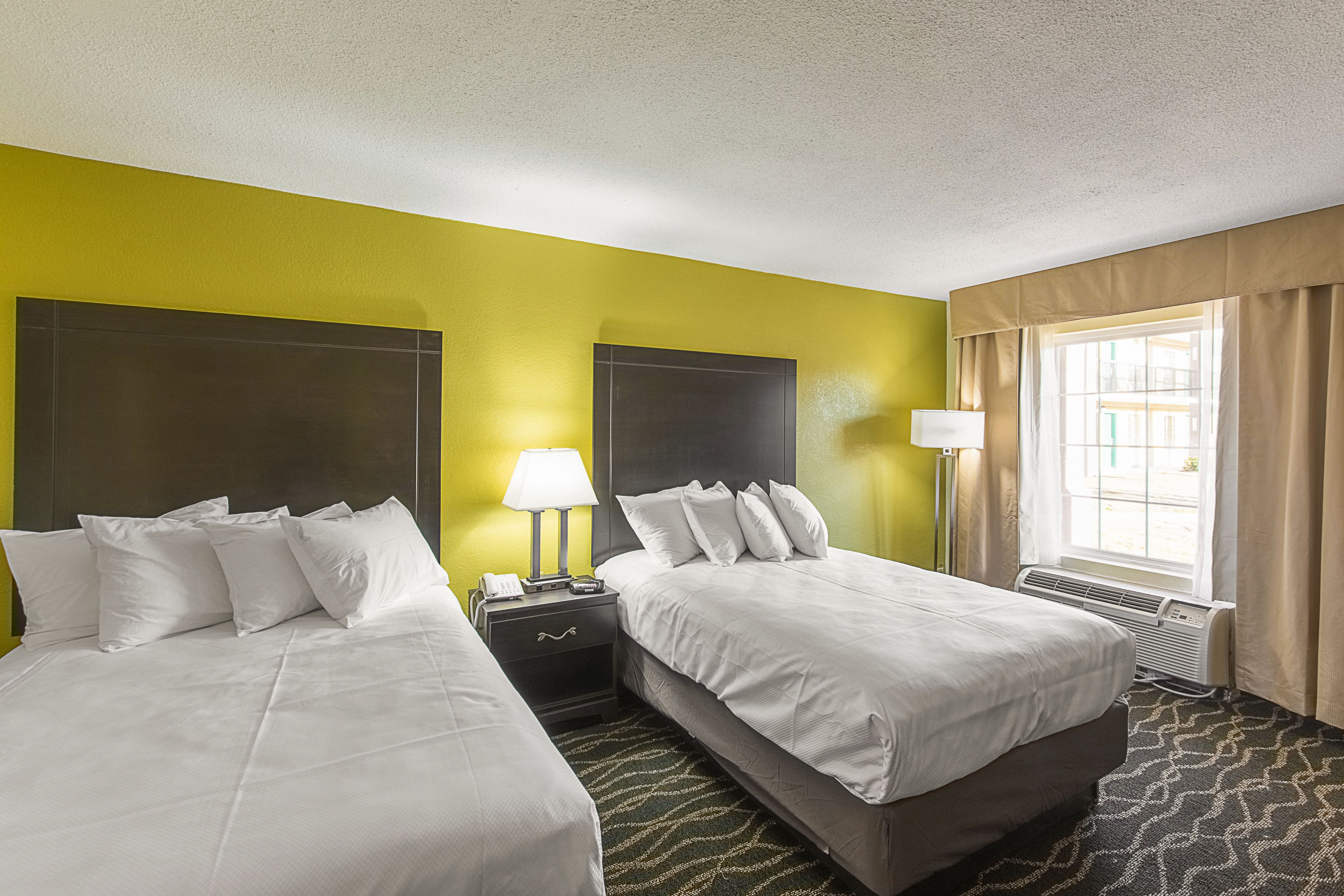 desk, blackout curtains, iron/ironing board, cots/infant beds