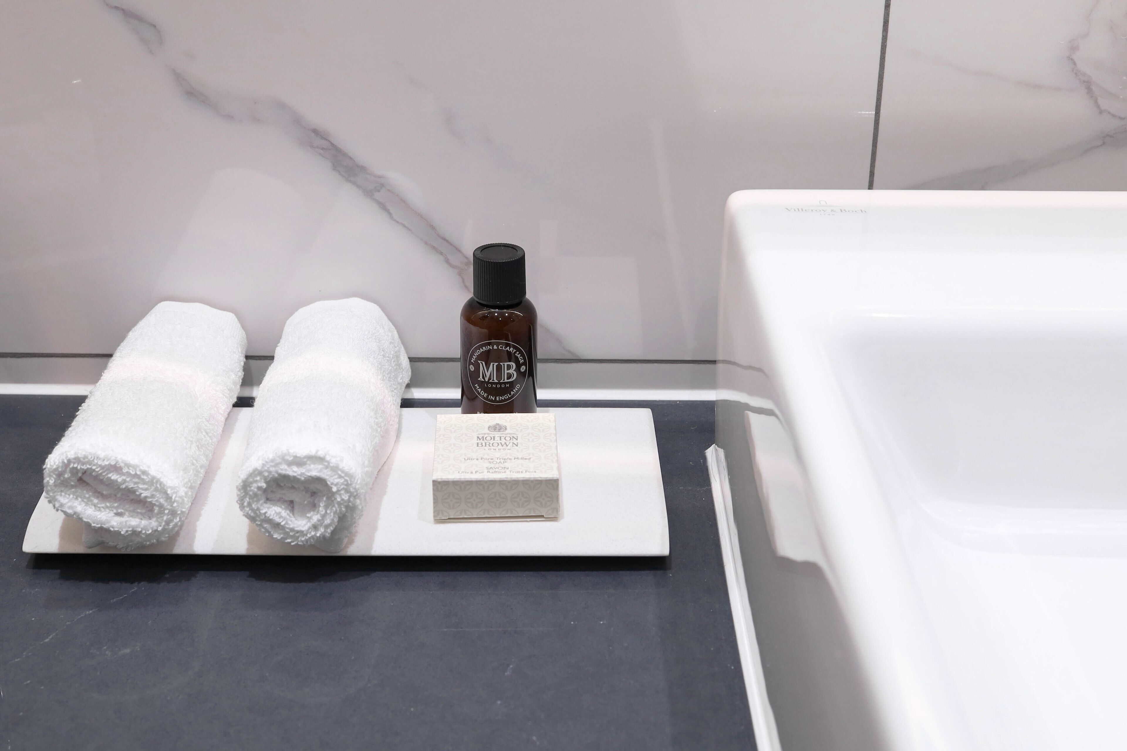 free toiletries, hair dryer, slippers, towels